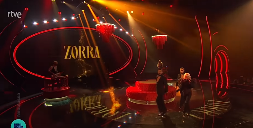 НА ШПАНЦИТЕ НЕ ИМ ДОАЃА УМ: Повторно украдоа српска песна за на Евровизија, овој пат од Неда Украден и ја крстија „Зора“ – на сцената мажи во танга играат голи!